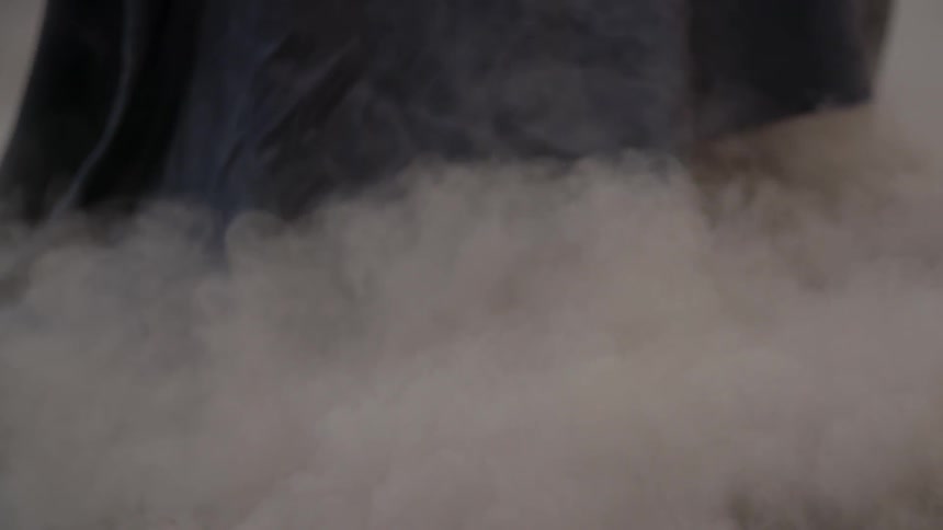 Dirt and dust billow and explode at an object's base