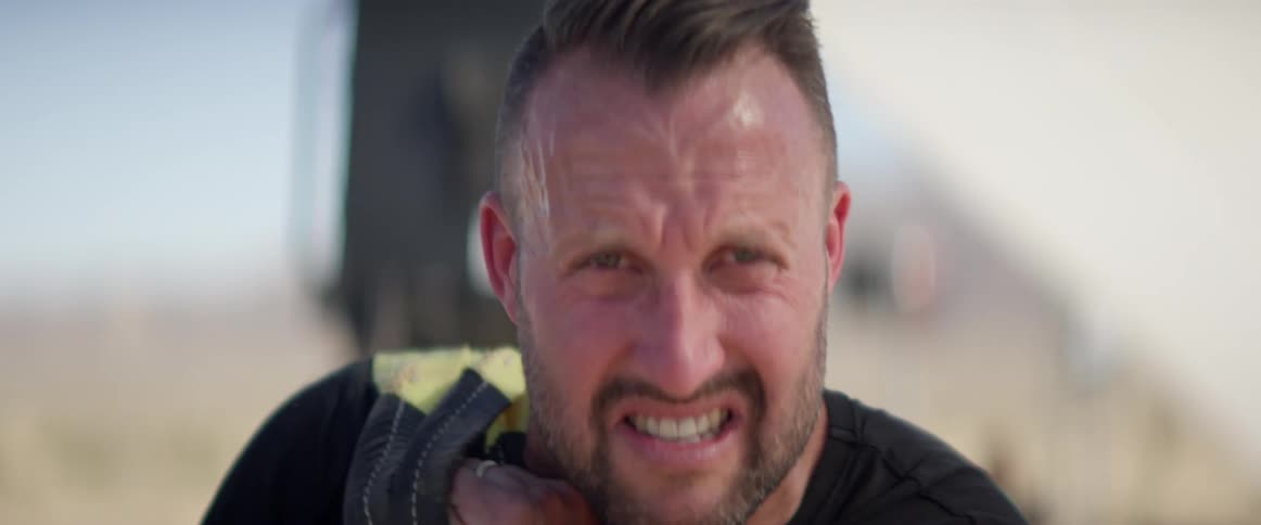 A man is working out outdoors