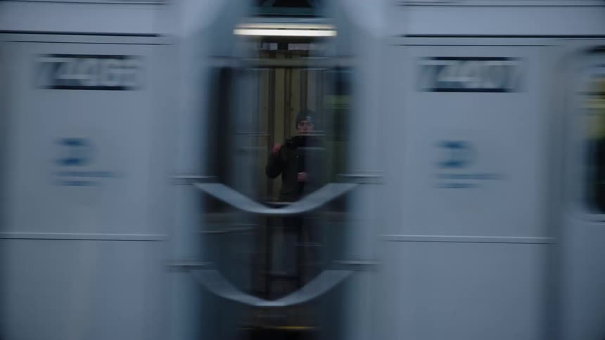 The train is full of people as it moves on