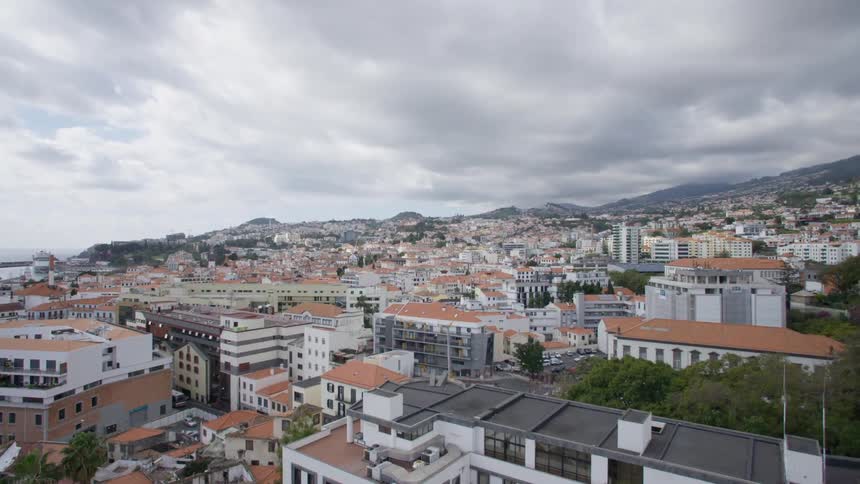 Multistory buildings in a city on a cloudy day