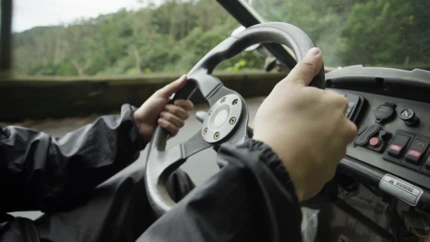 A man drives a car