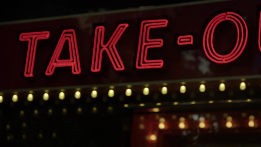 Neon advertisement in a city