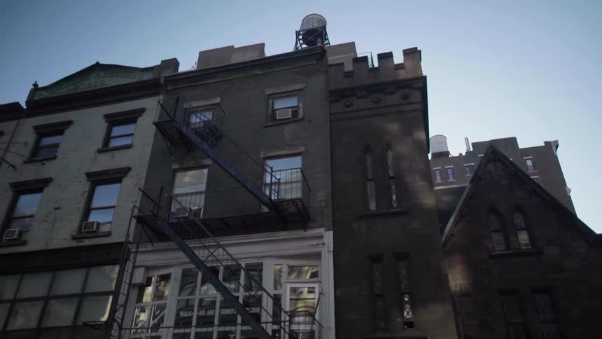 Row housing with fire escapes in an urban area