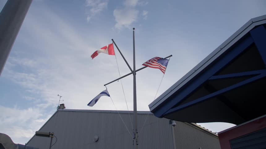 The flag of nova scotia the maple leaf flag and the star spangled banner
