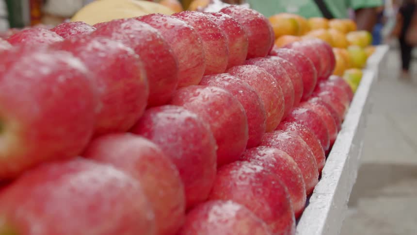 A row of pink lady apples
