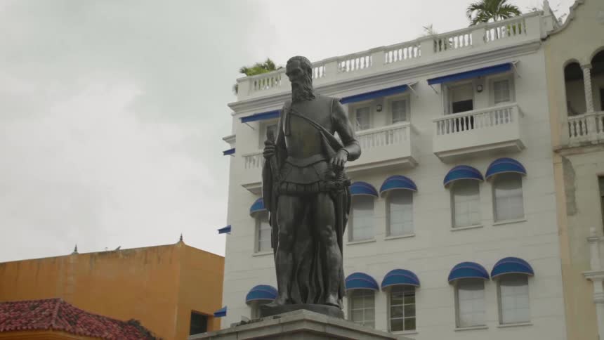 A bronze statue in a city
