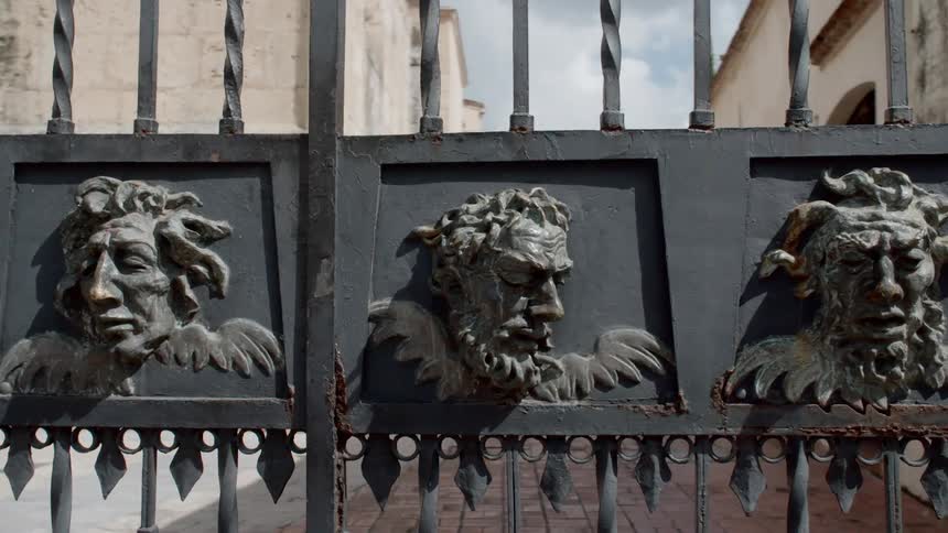 Gargoyles on iron gates