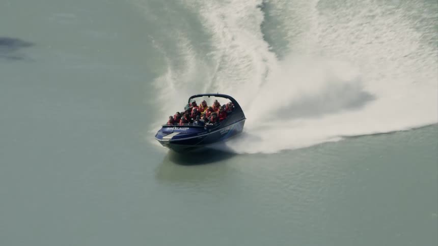 People riding on a speedboat on a river