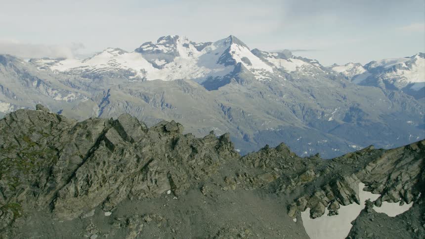 The snow is on top of the mountain