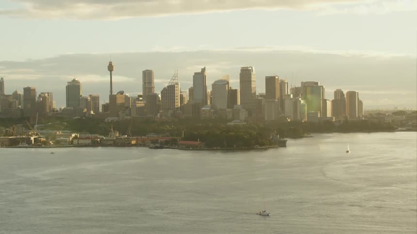 Boats in the harbor around a city skyline Sydney Harbour