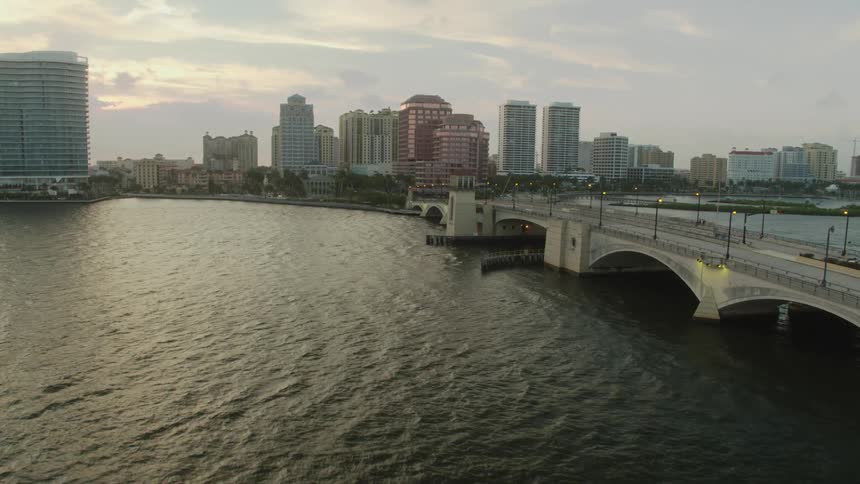 The waves crash around the city