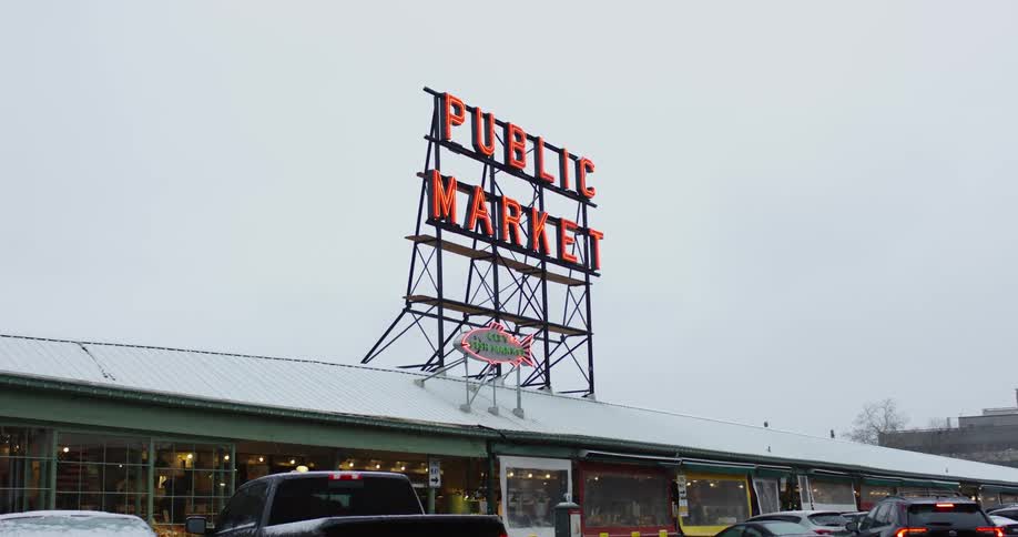 Metal frame signage on rooftop of store