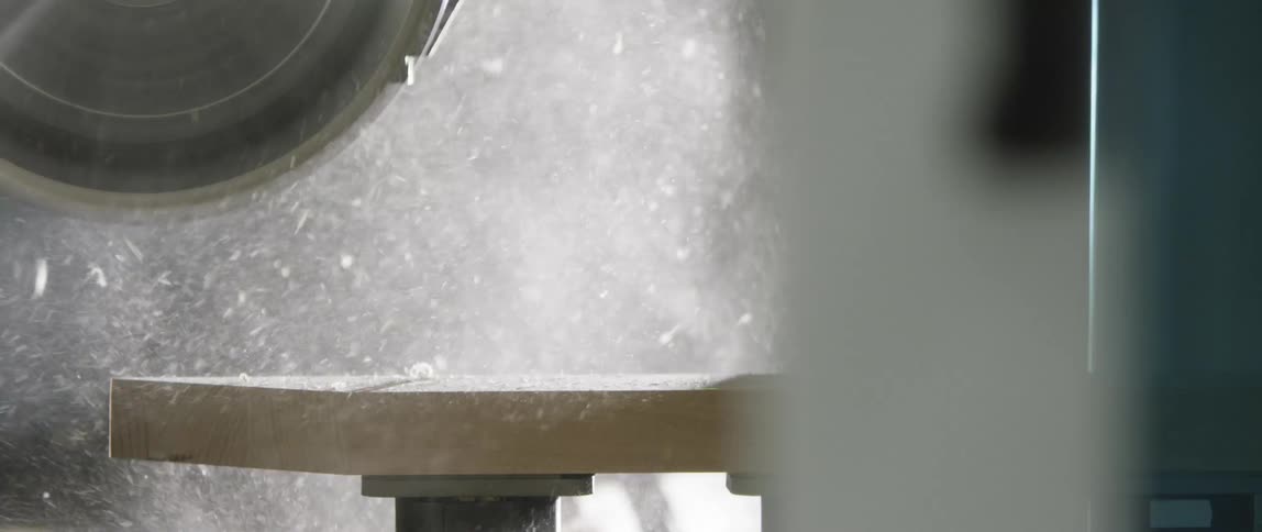 A saw blade spinning in a shop