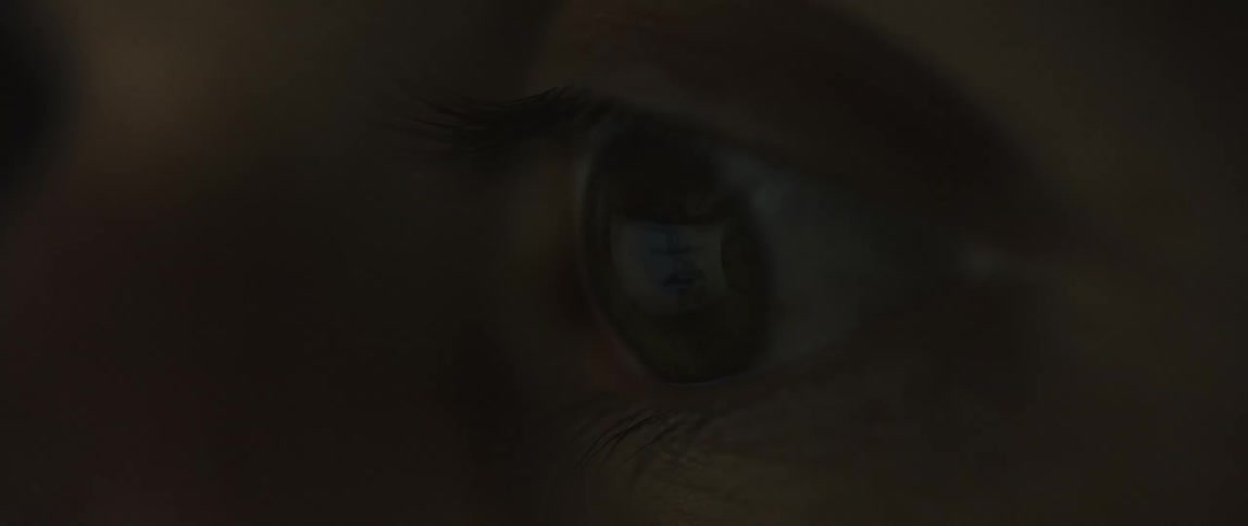 A closeup of an eye is displayed