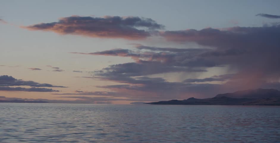 View of the calm sea at sunset