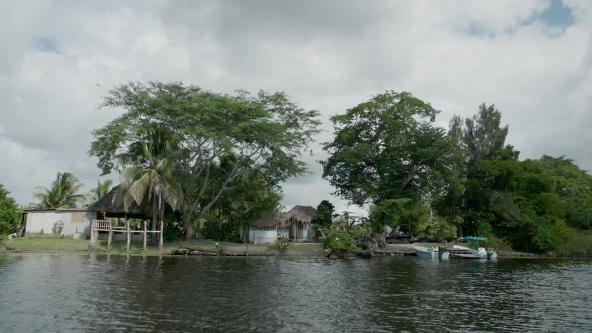 Shot of a house by a river