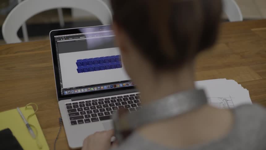 A woman working on her laptop