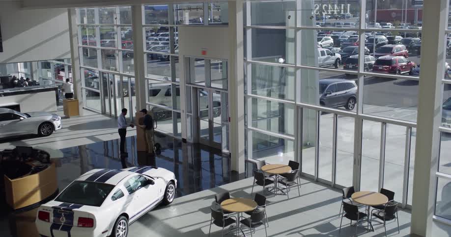 A car dealership during the day