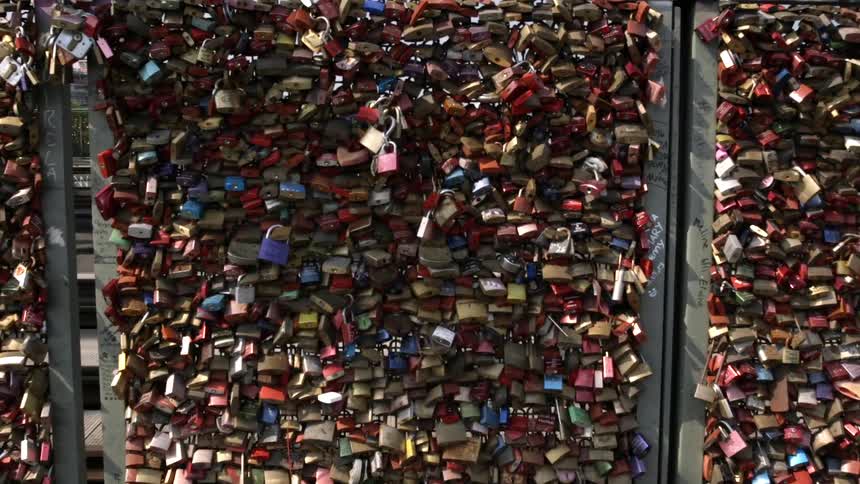 Padlocks on a barrier wall called the locks of love