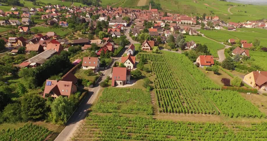 Farmland lies outside a small village