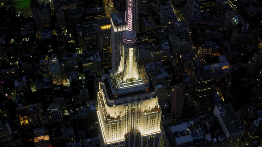 Buildings in a city lit up at night