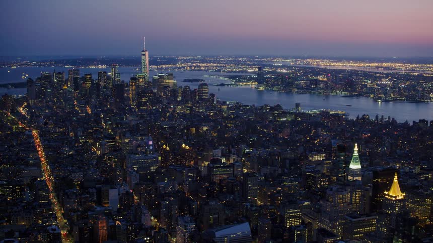 An aerial view of a downtown city is displayed