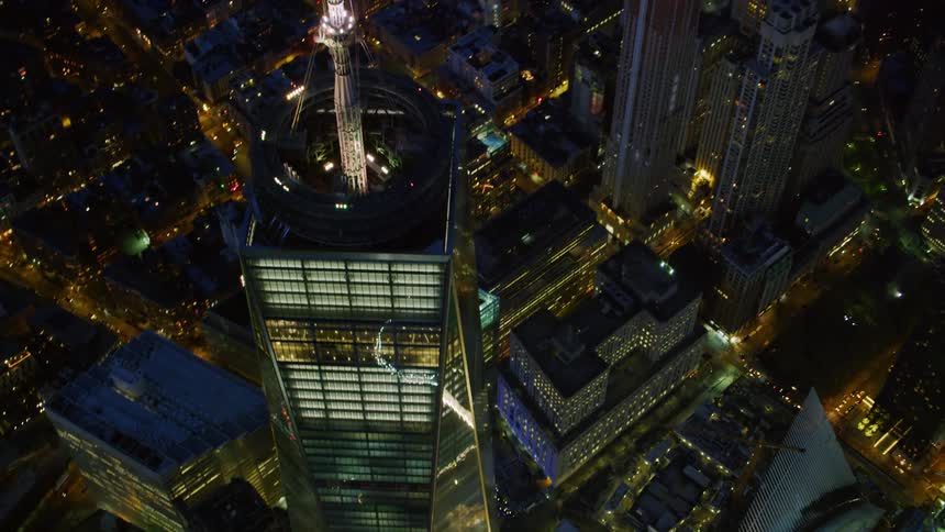 Aerial view of skyscraper in city downtown at night