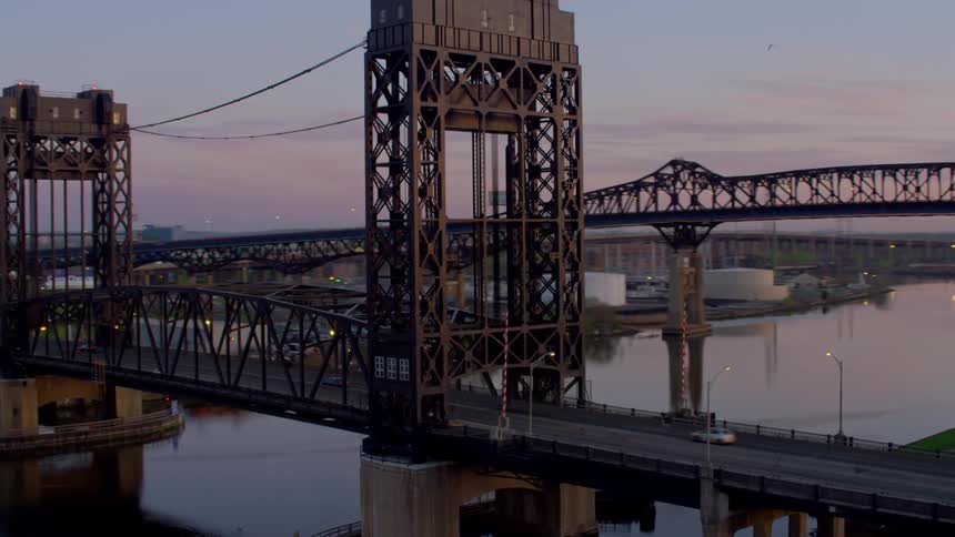 Cars driving across a bridge