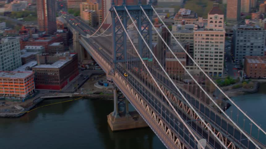 Manhattan bridge in new york city at sunset
