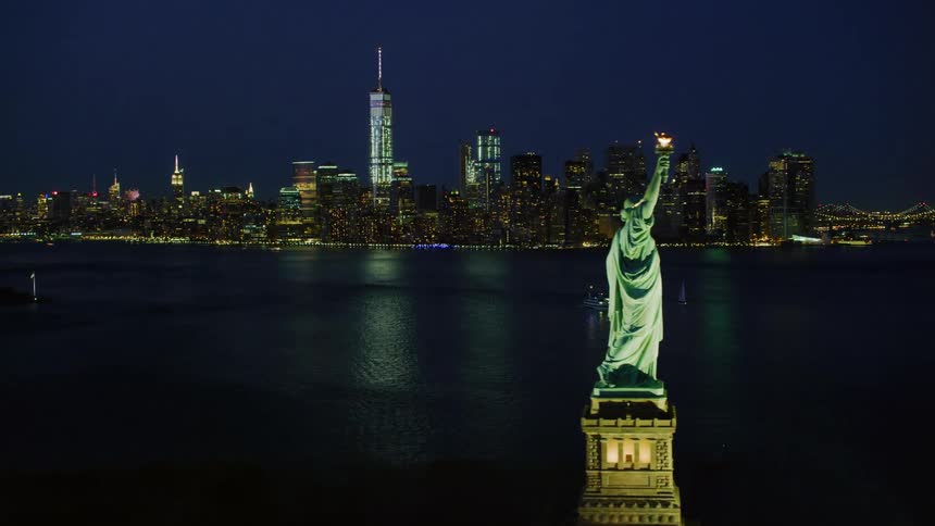An aerial view of the statue of liberty at night
