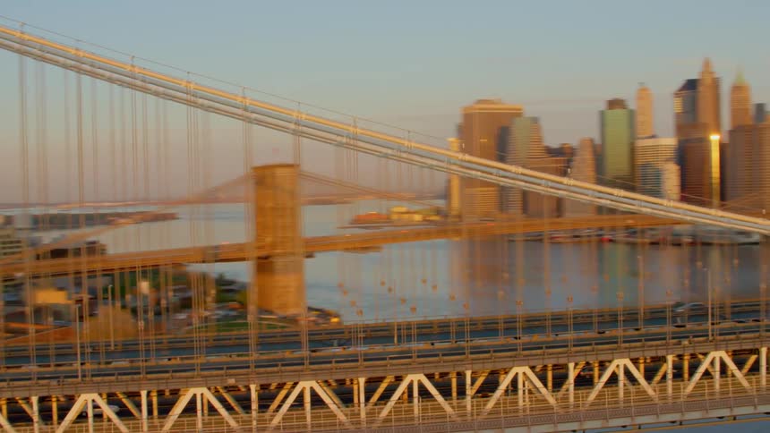 A river with bridges with the city skyline in the background