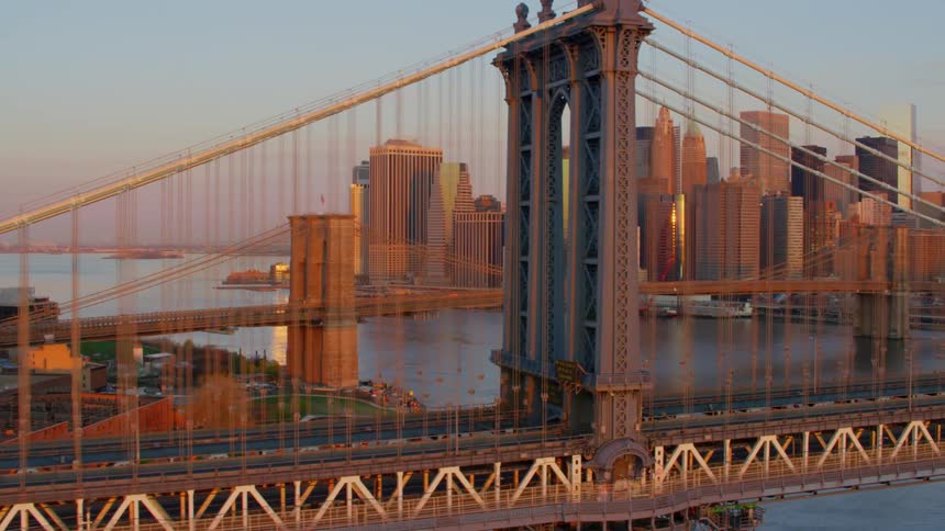 A river with bridges with the city skyline in the background