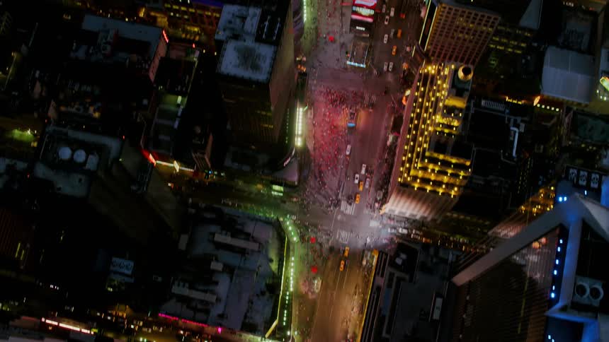 Digital signs and video displays dot skyscrapers at night