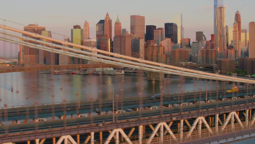 Aerial view of brooklyn and manhattan bridge on new york at sunset