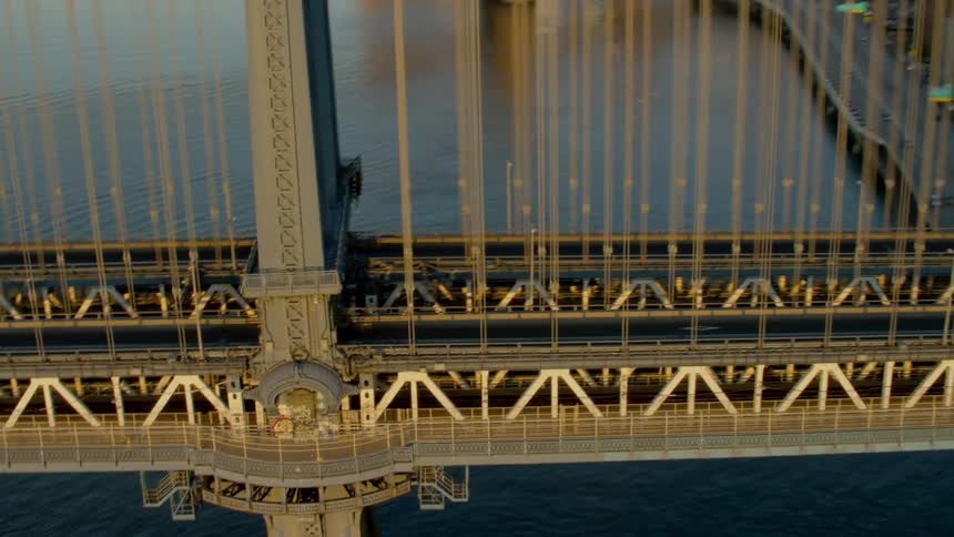 Cars driving across a bridge in the city