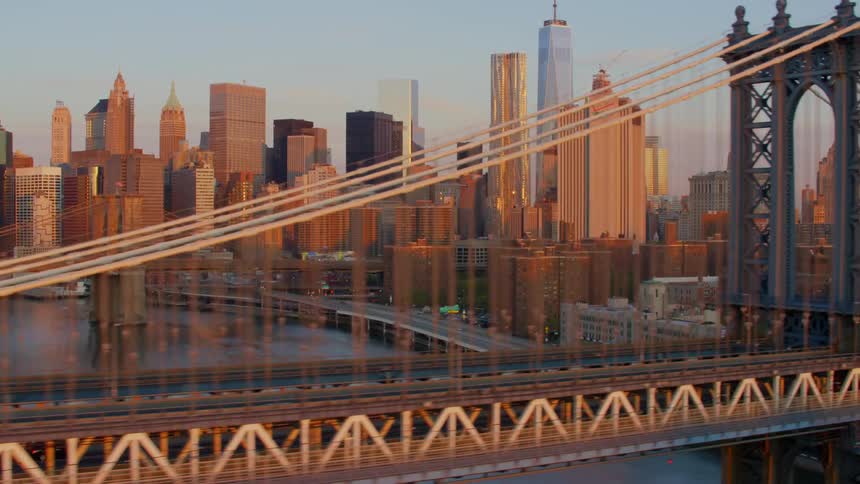 A river with bridges with the city skyline in the background