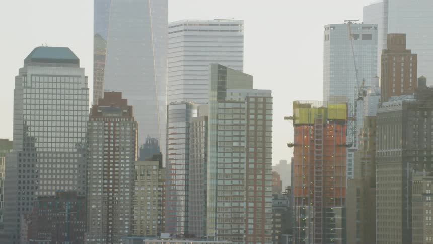 Mist softens lines of downtown city skyscrapers
