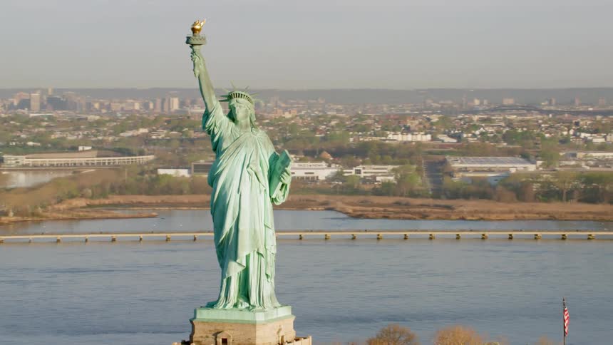 An aerial view of the statue of liberty on a fall day