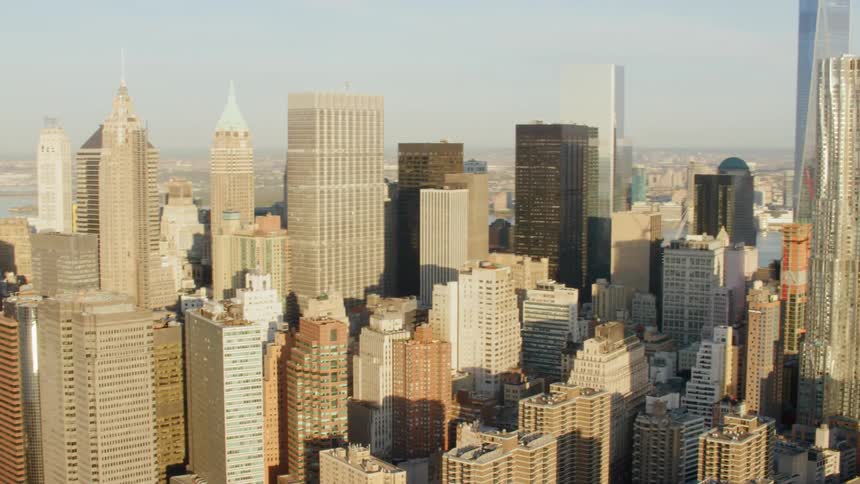 The city is covered in sunlight on a bright day