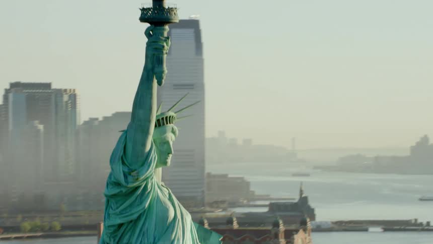 An aerial view of the statue of liberty is displayed