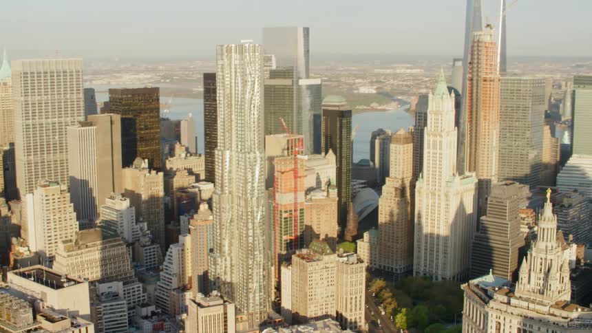 An aerial view of a downtown city is displayed