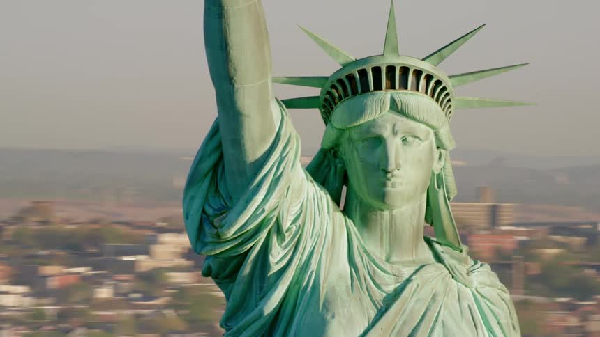 The statue of liberty stands in new york harbor