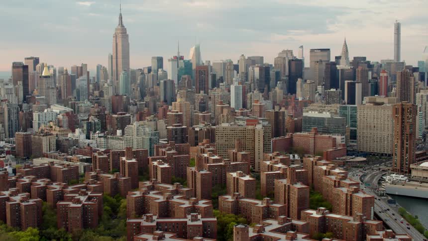 An aerial view of a downtown city is displayed during daytime
