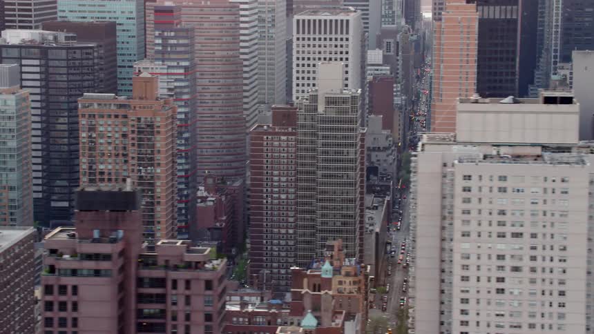 The tall buildings cover the city blocks