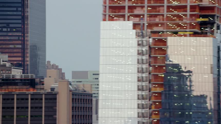 The sun if reflecting off the tall buildings