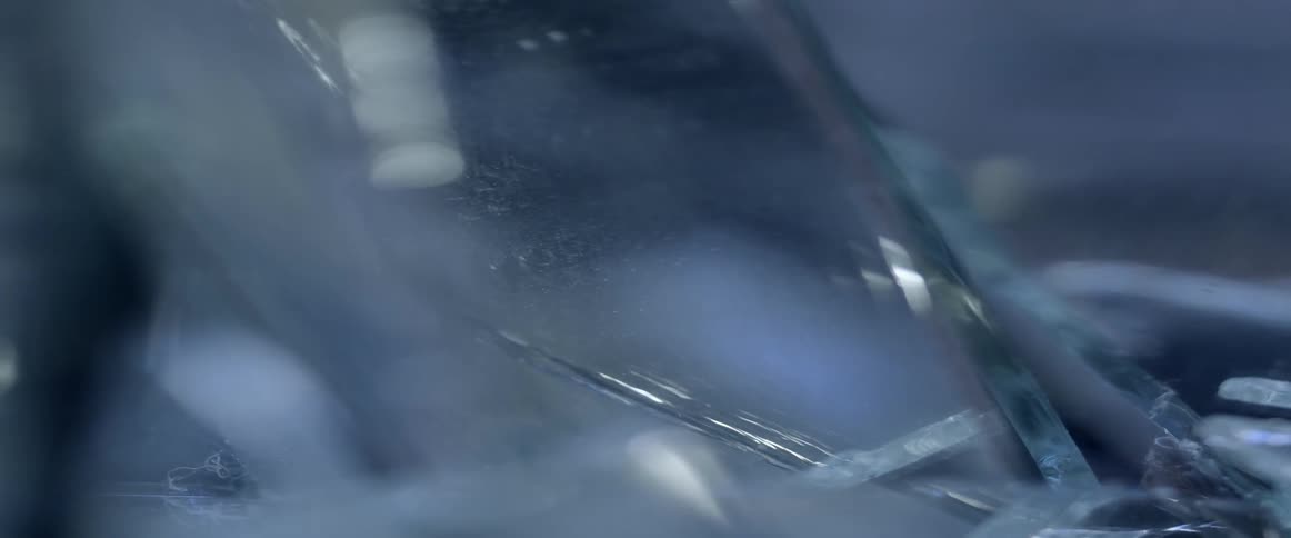 Several glass fragments lie together
