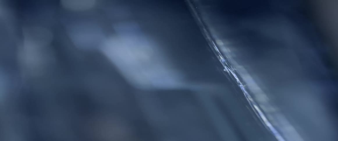 Focus switches between several shards of broken glass