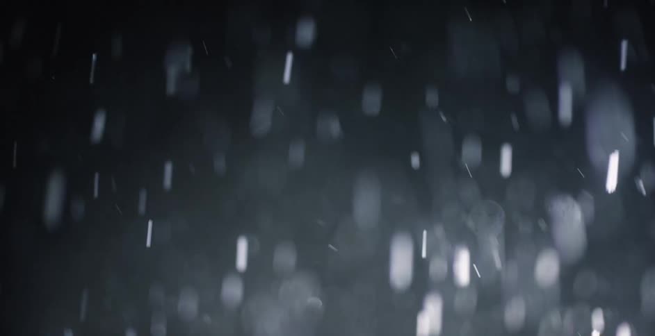 Snow falling at night time