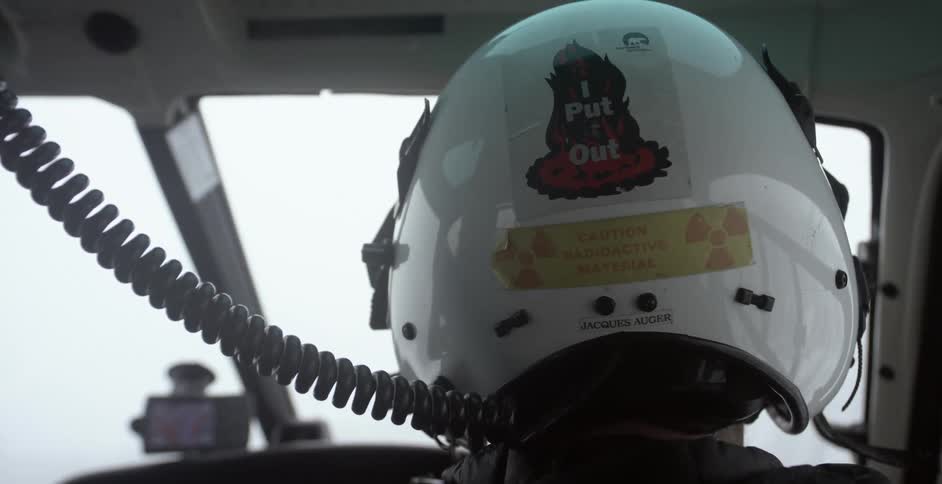 The pilot of a helicopter from behind