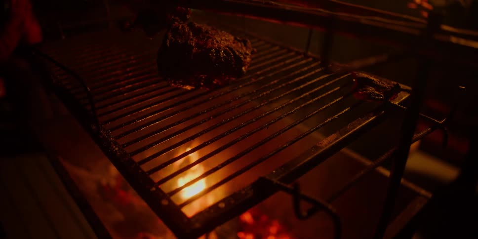 Food grilling over an open flame